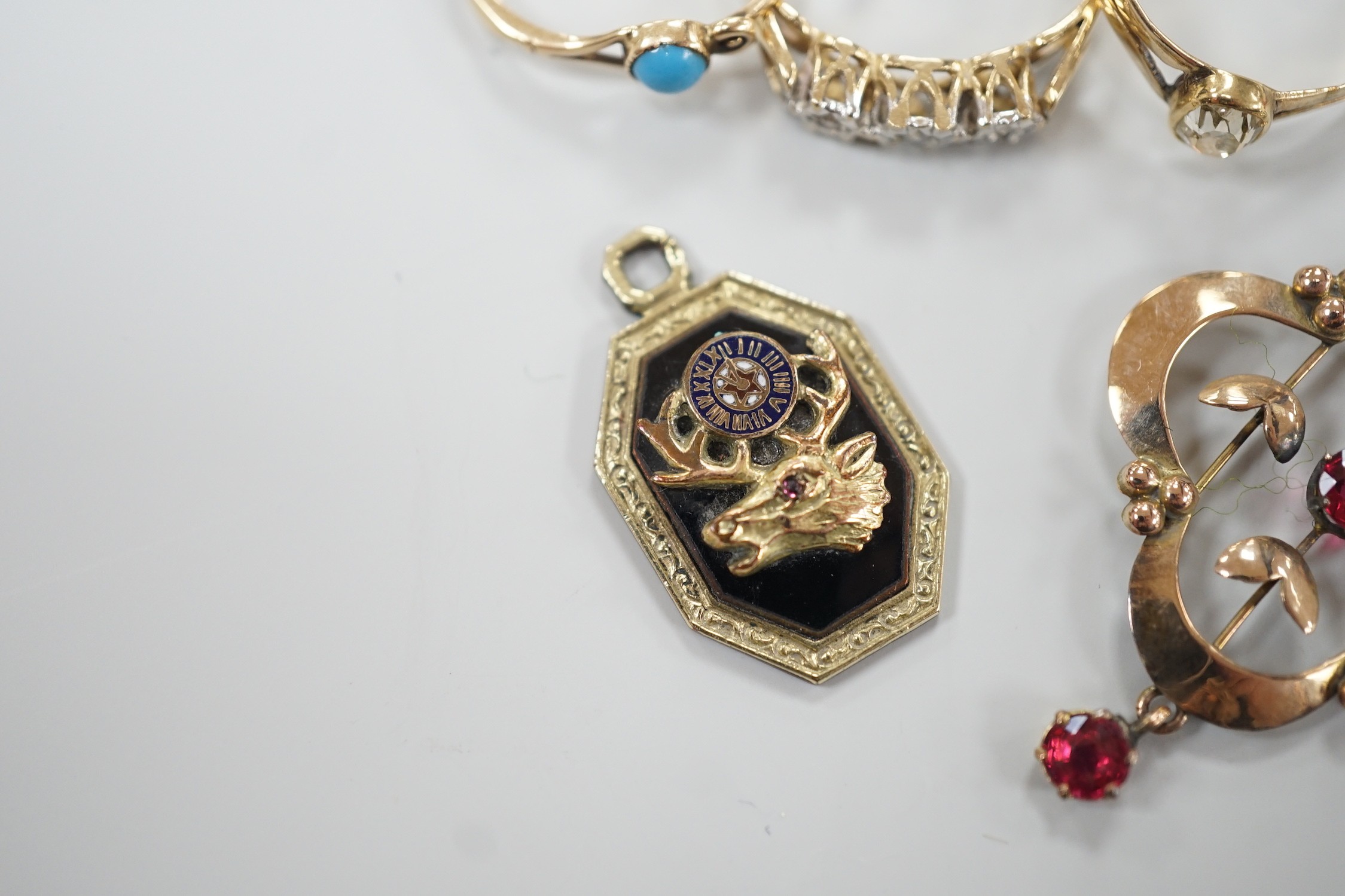 A yellow metal and old mine cut solitaire diamond set ring, size N, gross 1.1 grams, a 9ct gold and three stone diamond chip set ring, a yellow metal and turquoise set earring, an enamelled pendant and a 9ct and gem set